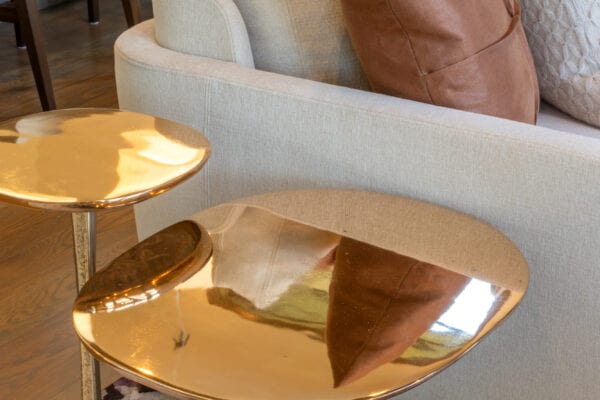 Sofa with gold side tables