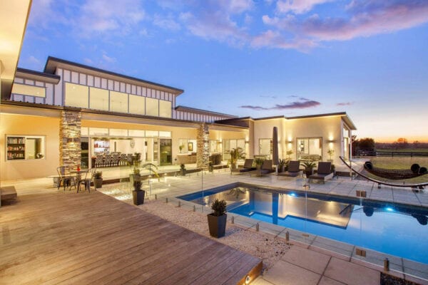 Back view of home and pool