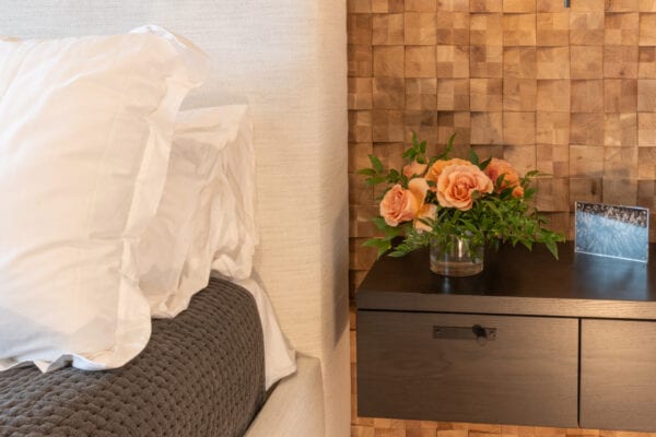 Bouquet of flowers on hanging side table.