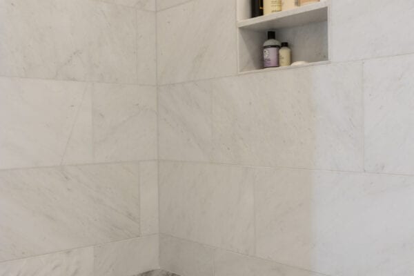 Shower seat and built-in shelves.