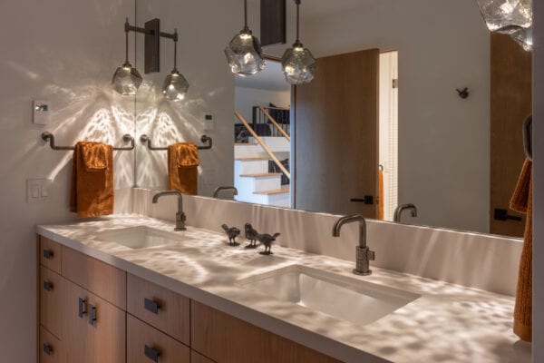 Bathroom vanity with artistic lighting