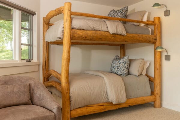 Log bunkbeds with matching wall lamps