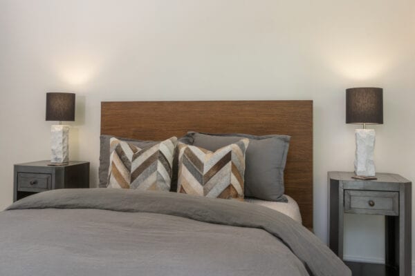 Bed with matching side tables and lamps